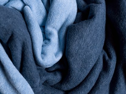 Water-based melamine resins for high performance textiles